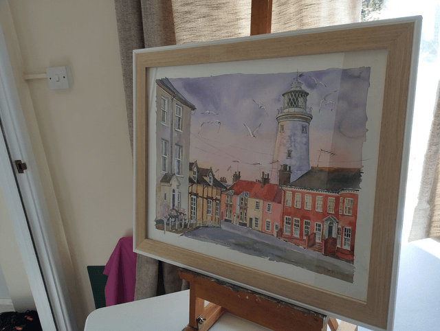 Southwold Lighthouse on sunset lights. Original watercolor